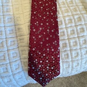 Dark red silk tie with floral designs